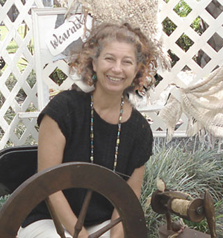 Fiberartist, A. Cappa at spinning wheel